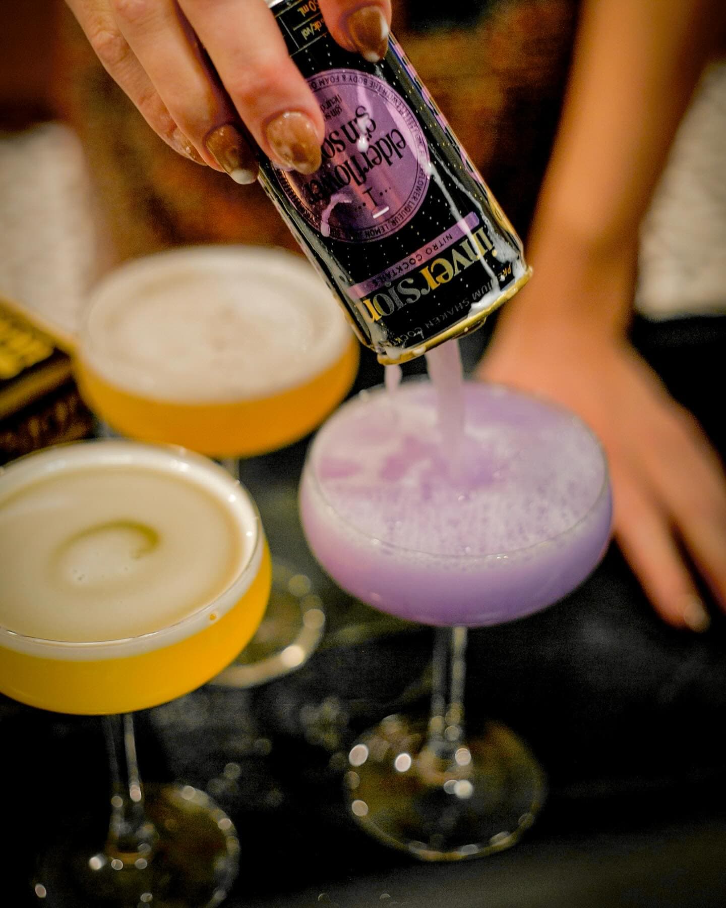 Cocktails lined up along the bar at Fashion for Heart